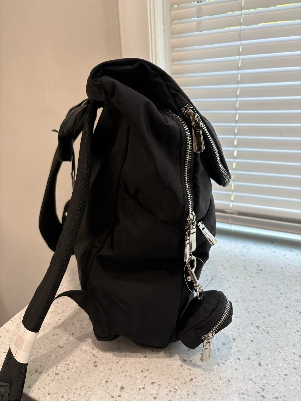 NWT House of Harlow 1960 backpack in a classic black w/ silver-tone hardware